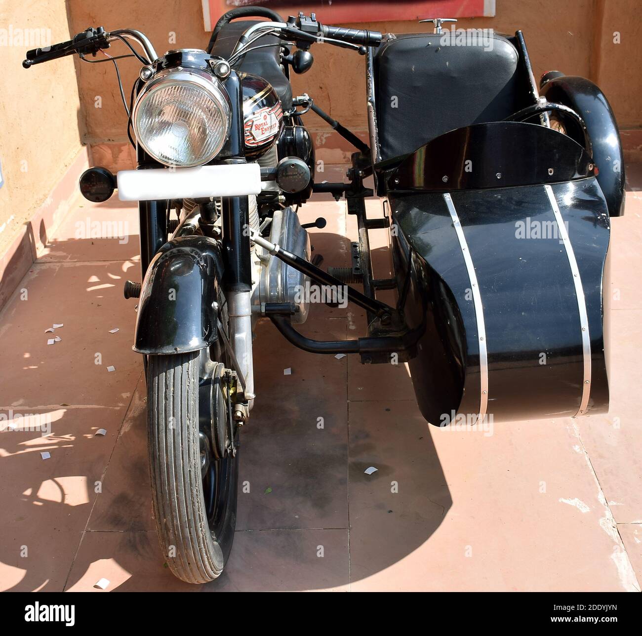 An Indian motorcycle with its sidecar. A sidecar is a one-wheeled device attached to the side of a motorcycle, scooter, or bicycle, making the whole a Stock Photo
