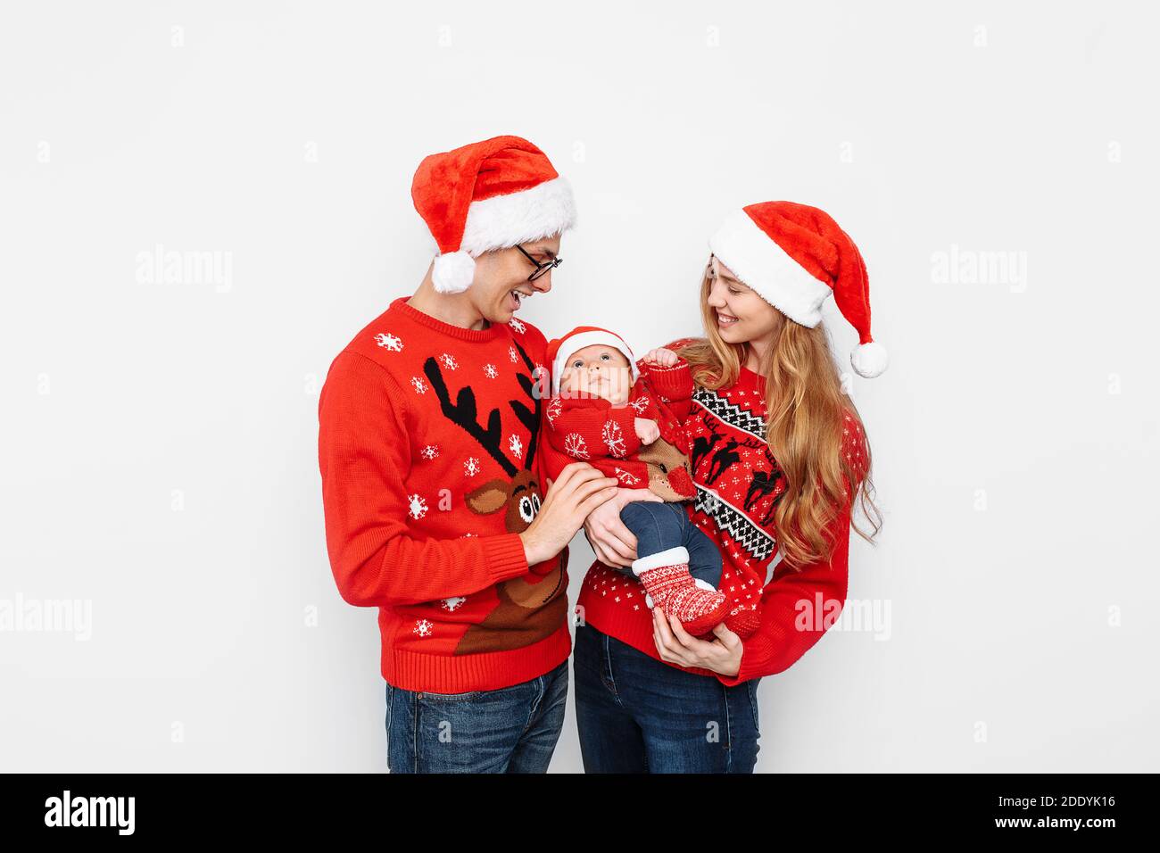 santa hats and christmas sweaters 