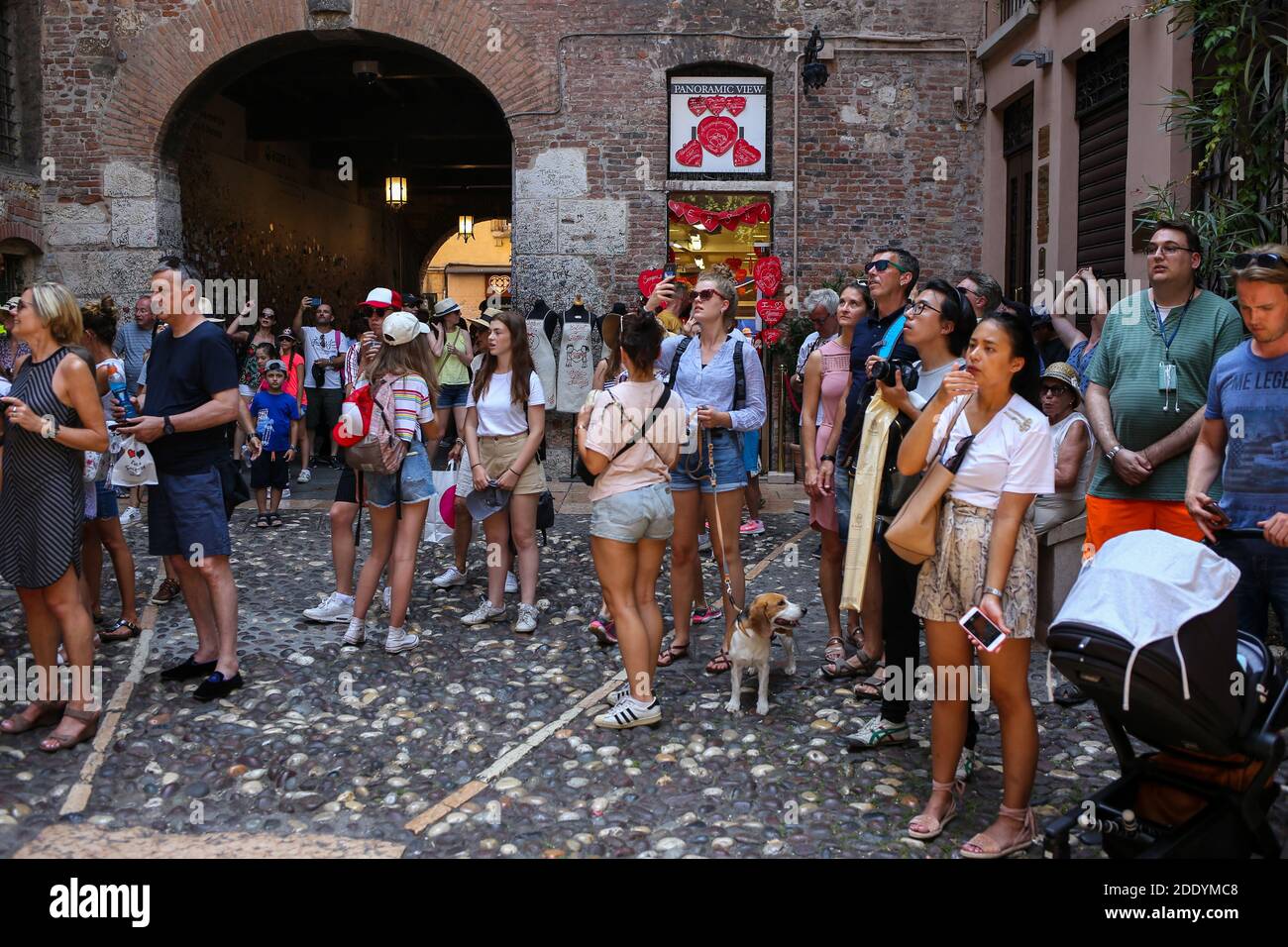 Italy, Verona - 02 July 2020: Julia's house Verona (Casa di Giulietta). Tourists visiting Julia's house Stock Photo