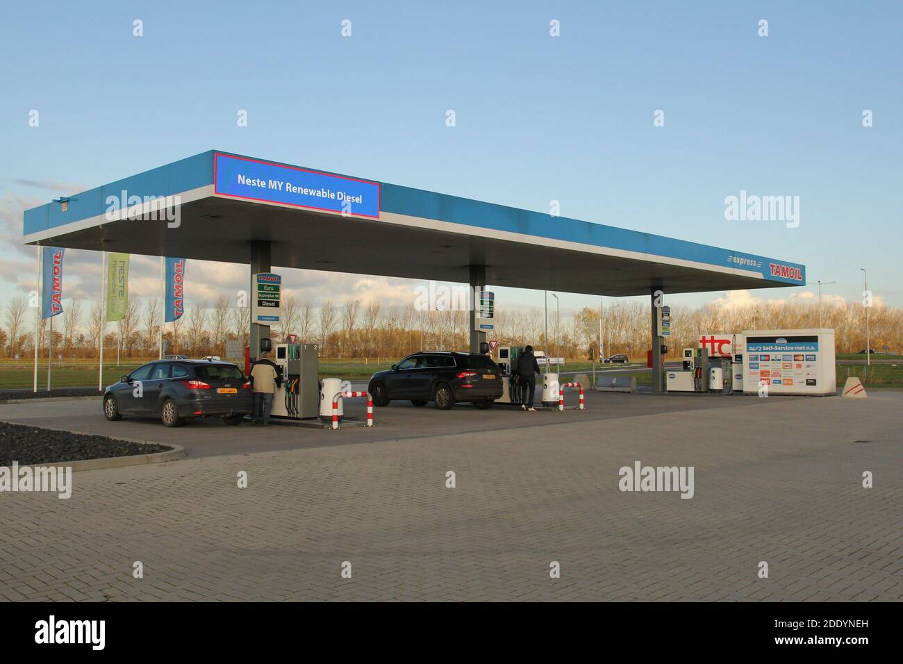 an unmanned petrol station in the dutch countryside in zeeland along the highway in autumn closeup Stock Photo