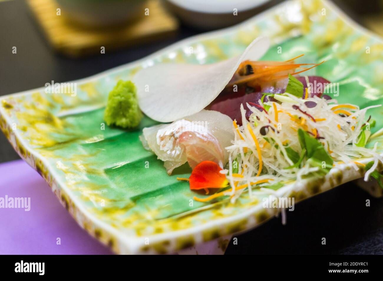 A plate of Japanese sashimi at a local restaurant in Aichi, Japan Stock ...