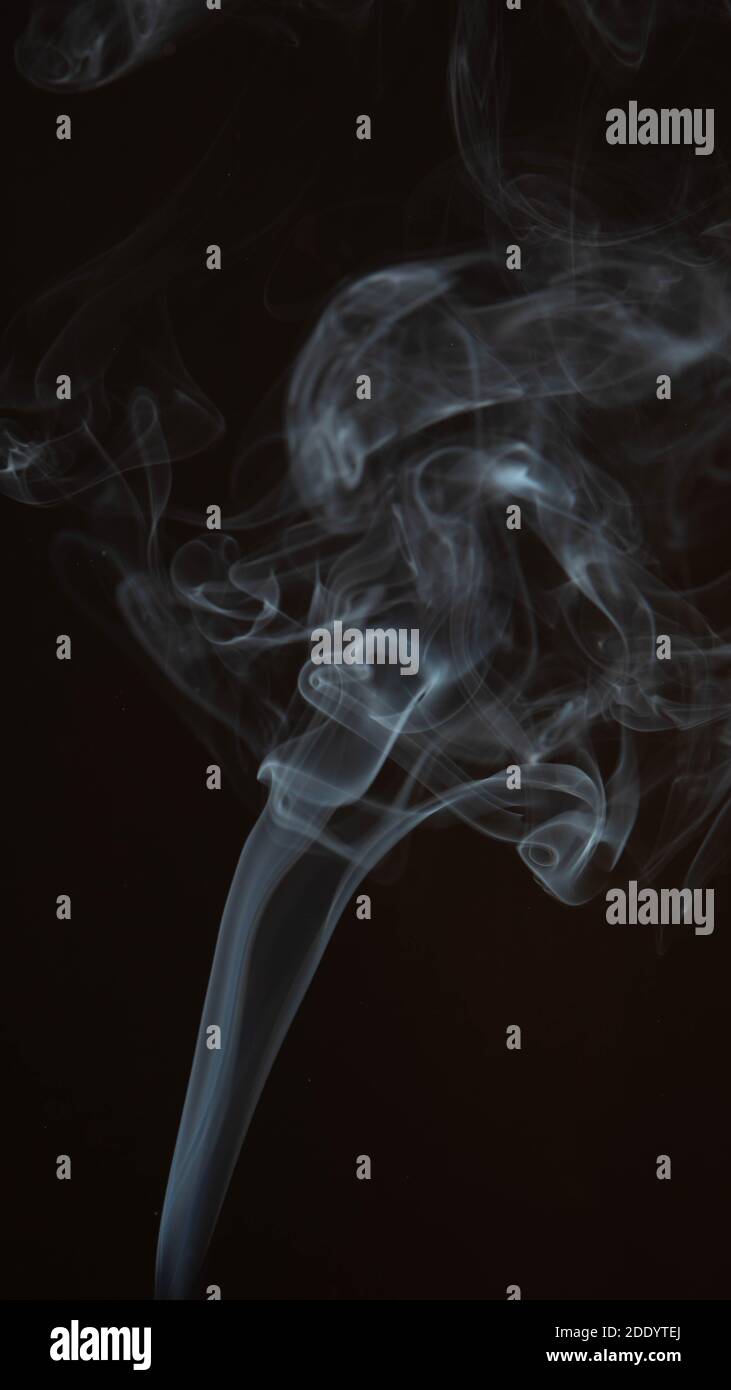White smoke on black background Stock Photo - Alamy