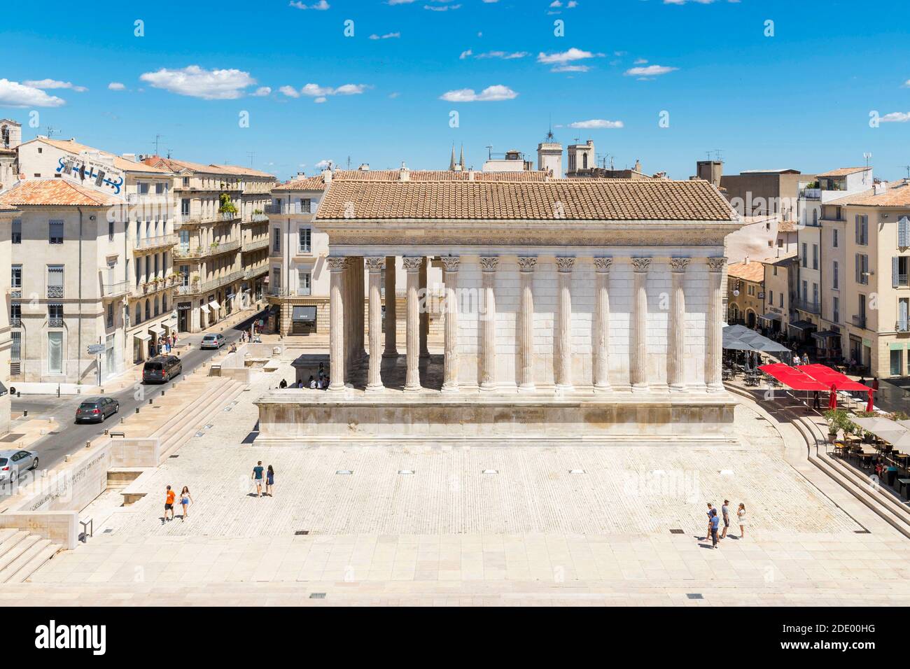 Nimes (south-eastern France): the Roman temple “Maison Carree” (Square House) viewed from the terrace of the “Ciel de Nimes” restaurant. Roman temple, Stock Photo
