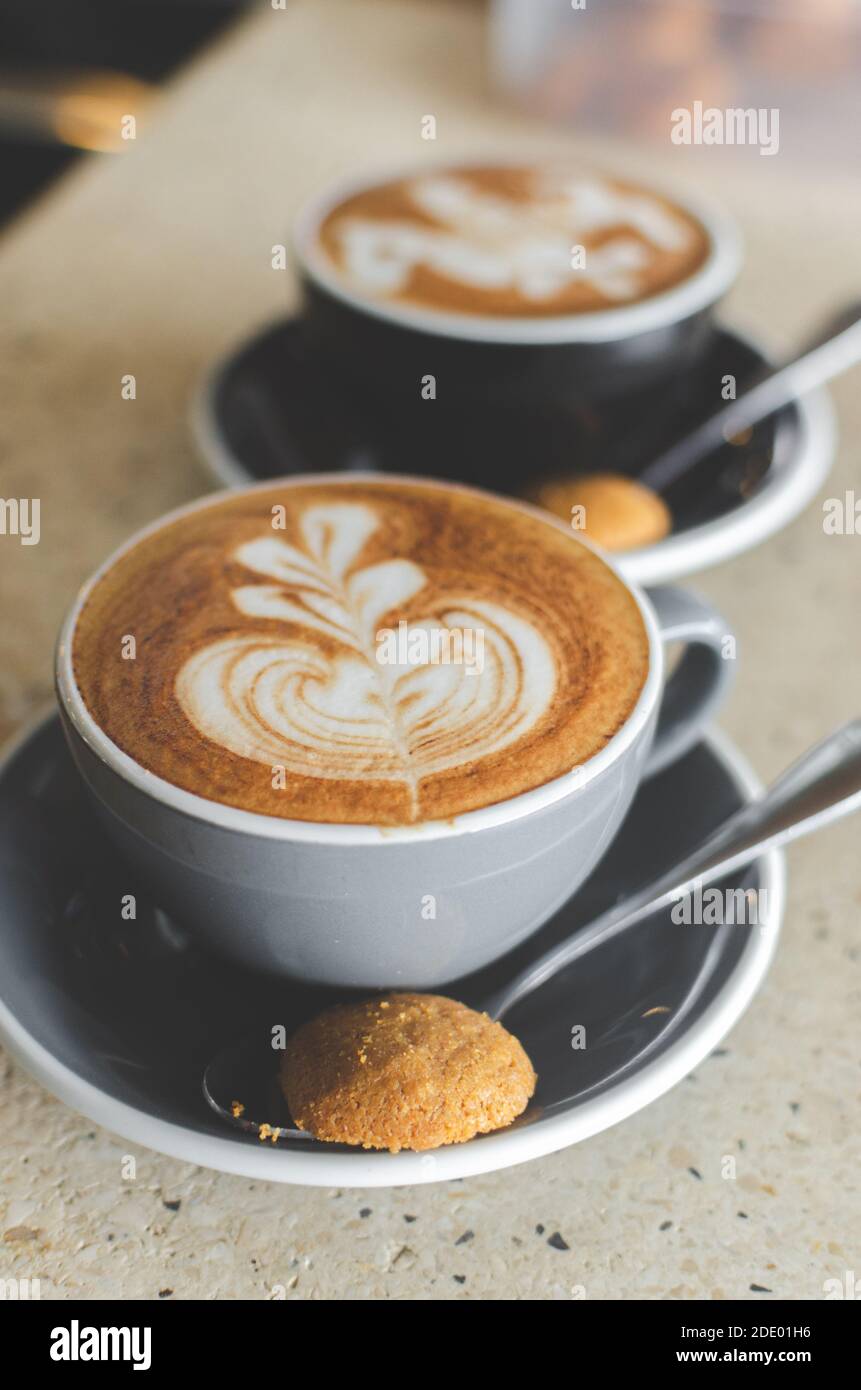 Hot Cappuccino in a cup made in a small coffee shop in Canggu, Bali