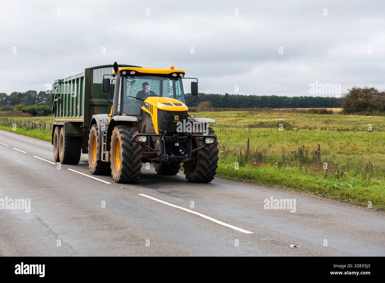 speeding tractor Stock Photo
