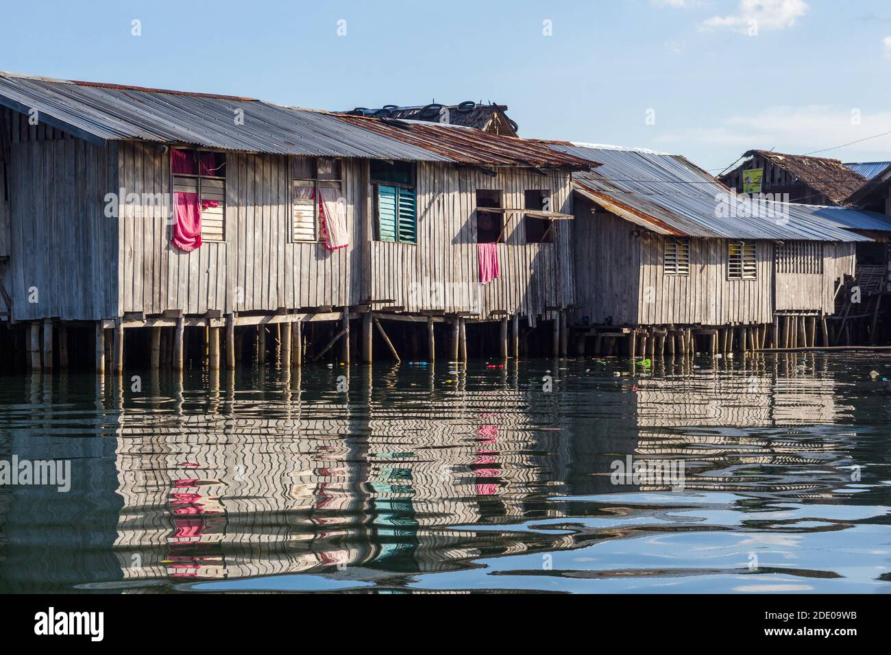 Wooden stilt houses at the shore in Pagadian City, Philippines Stock Photo
