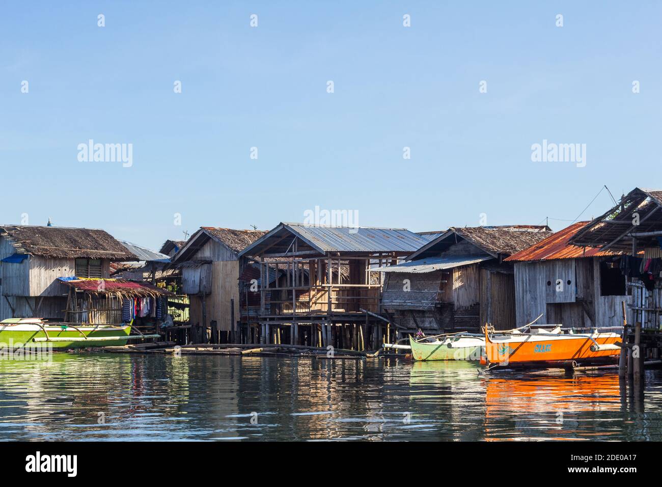 Wooden stilt houses at the shore in Pagadian City, Philippines Stock Photo