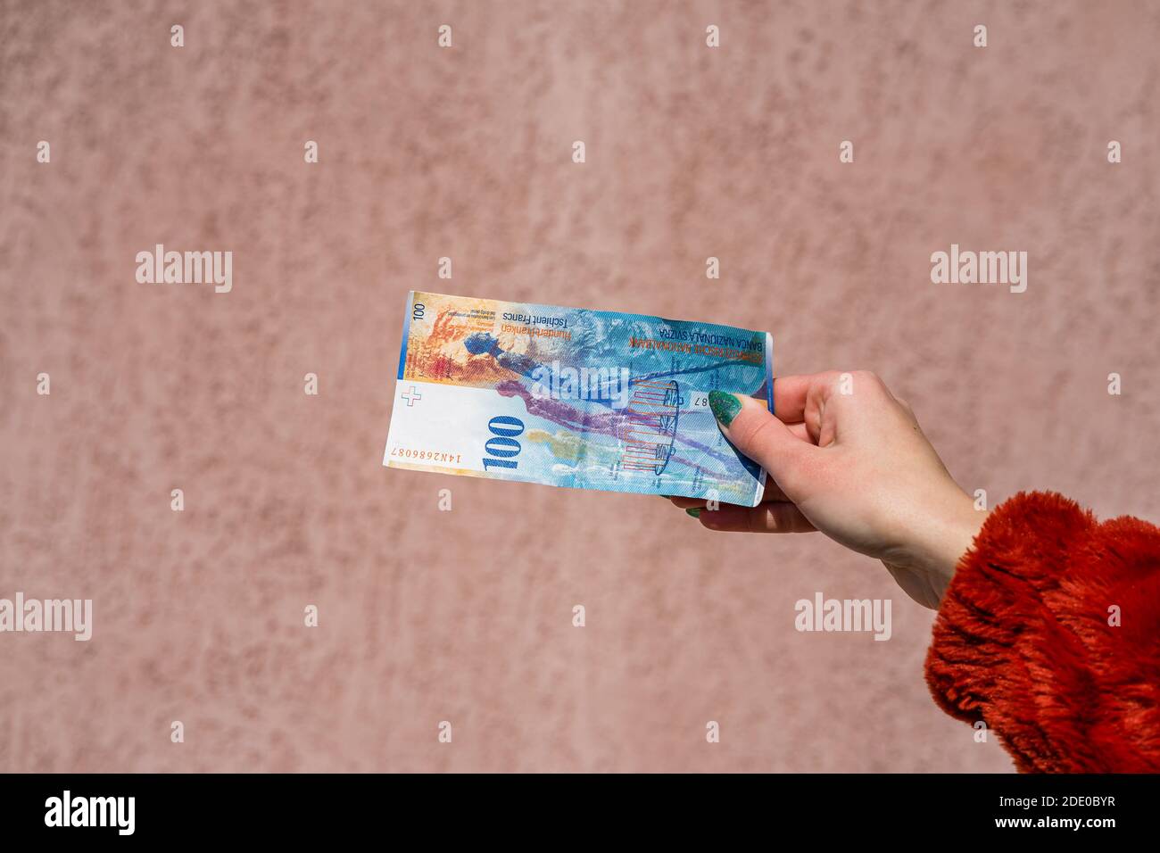 Hand Holding Showing Euro Money And Giving Or Receiving Money Like Tips Salary 100 Swiss Franc Banknotes Chf Currency Isolated Concept Of Rich Busi Stock Photo Alamy