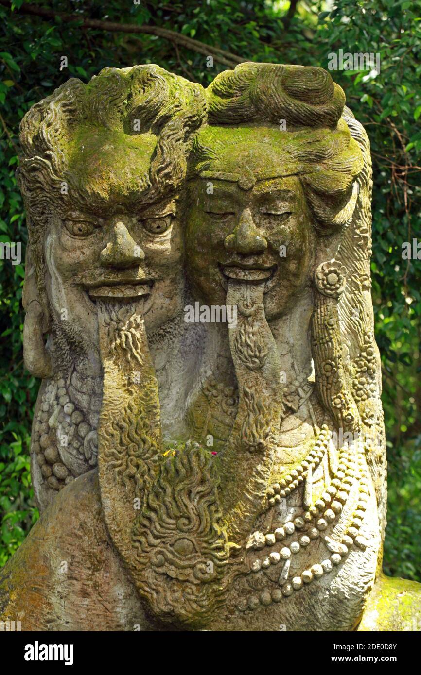 Old sculptures in Ubud Monkey Forest, Mandala Suci Wenara Wana, Ubud, Bali, Indonesia Stock Photo