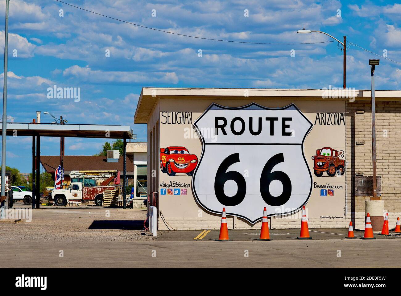 Seligman, Arizona, USA - July 30, 2020: A large painting of a 'Route 66' sign welcomes visitors to the town of Seligman, located on Historic Route 66. Stock Photo