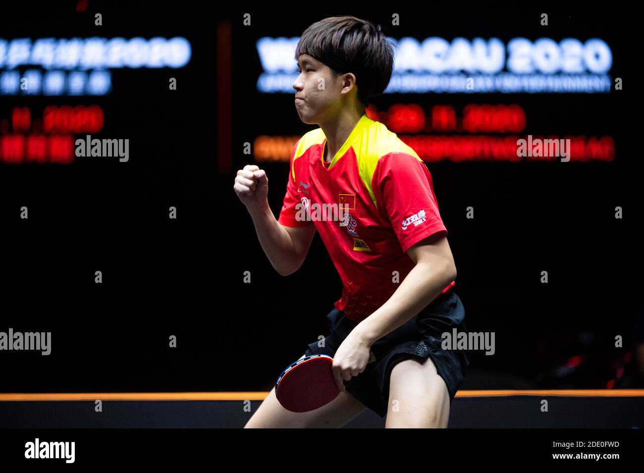 Macao, China. 27th Nov, 2020. Xu Xin of China returns the