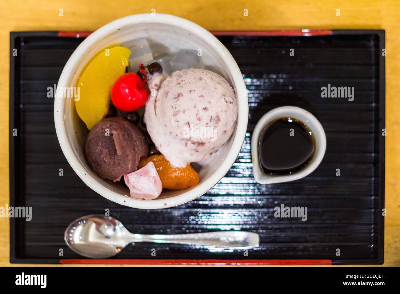 A bowl of ice cream and pieces of fruits in Tokyo, Japan Stock Photo