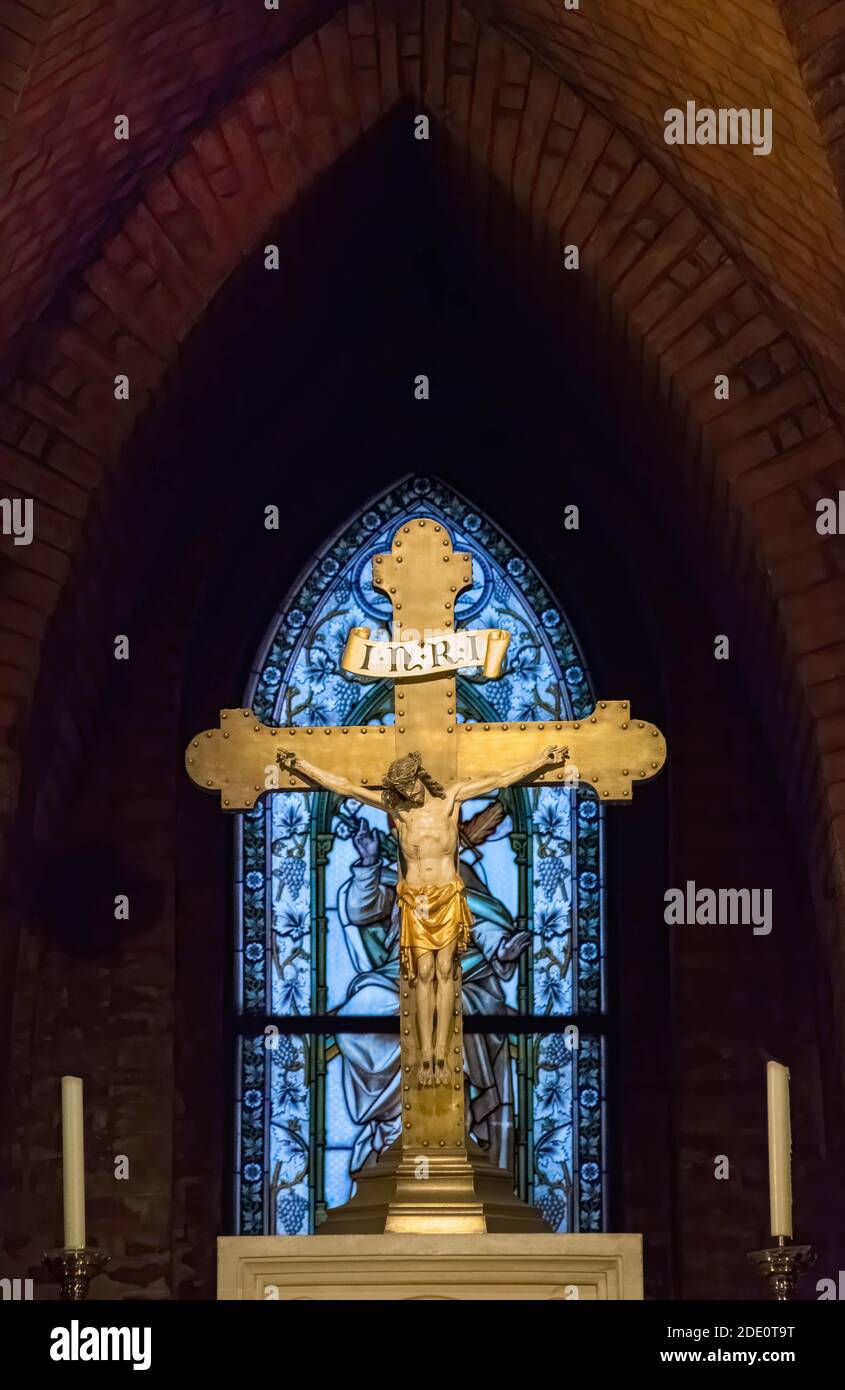 Jesus Christ on the cross in the altar of a church Stock Photo - Alamy