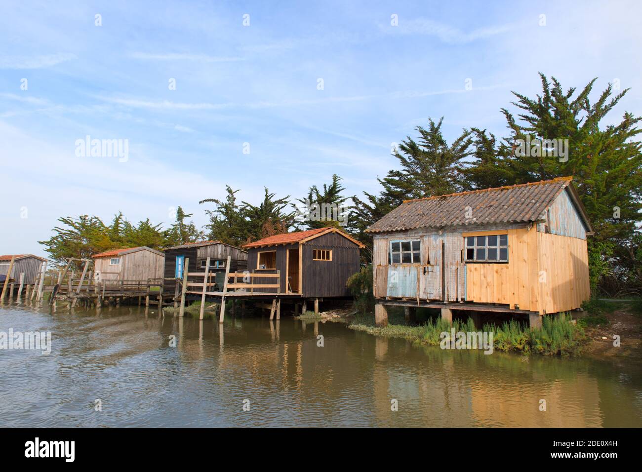 French wooden oyster huts in landscape in the France Charente Maritime