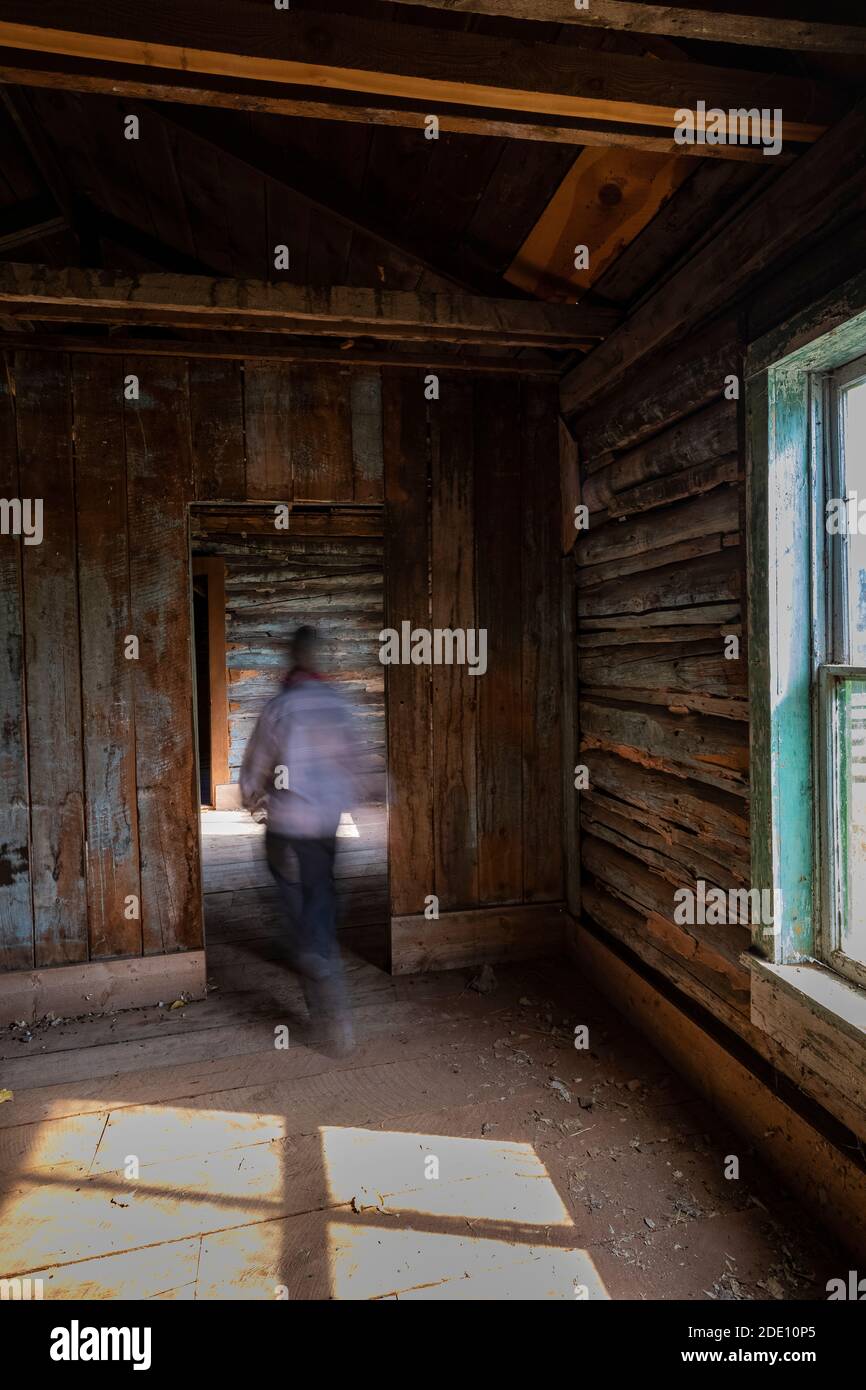 Karen Rentz walking through ranch house at Caroline Lockhart Historic