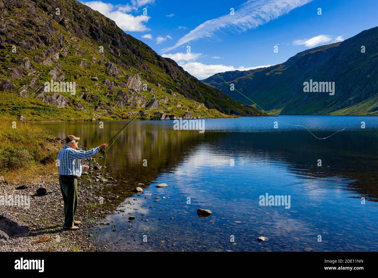 Fly fishing at Glenbeg Lough, Ardgroomm,Beara Peninsula, Co.Cork, Ireland Stock Photo