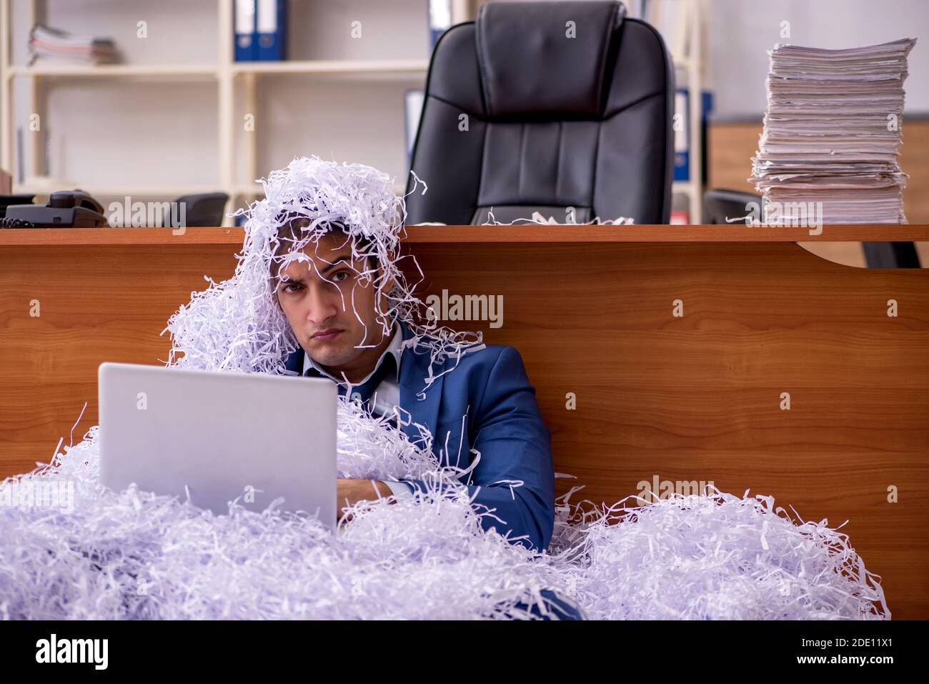 Paper shredder employee hi-res stock photography and images - Alamy