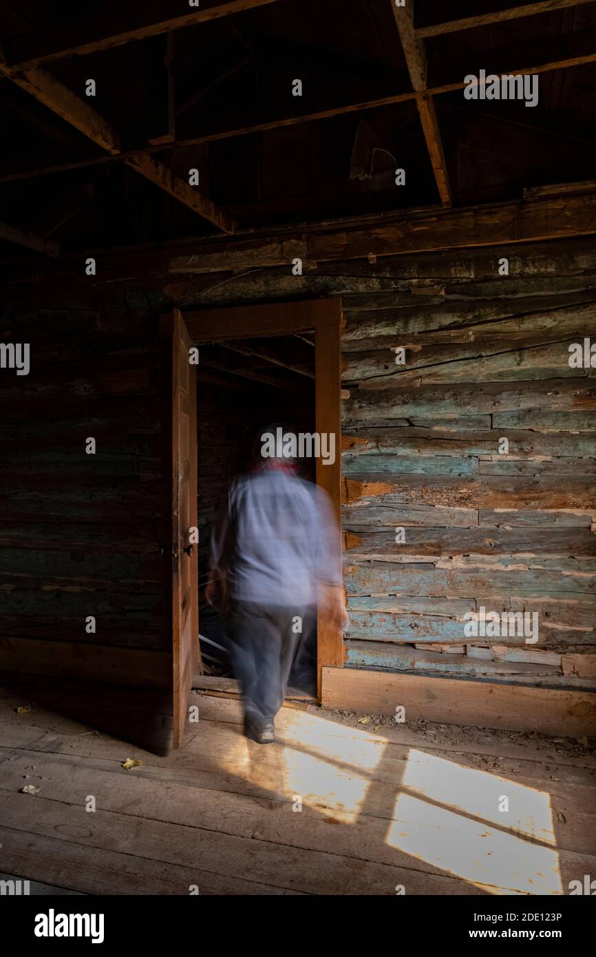 Karen Rentz walking through ranch house at Caroline Lockhart Historic