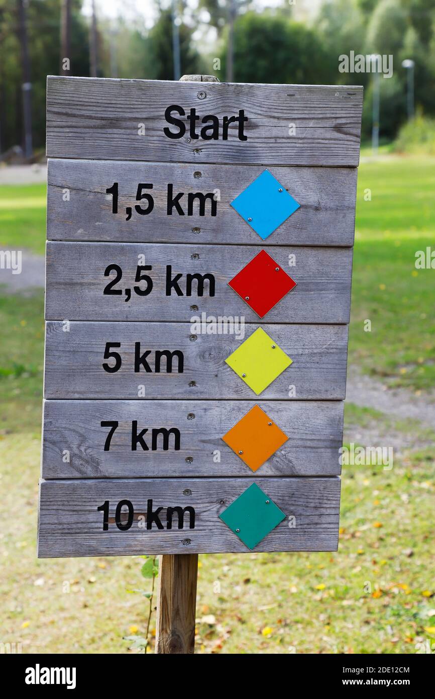 Color markings on a wooden board show the length of the exercise tracks Stock Photo