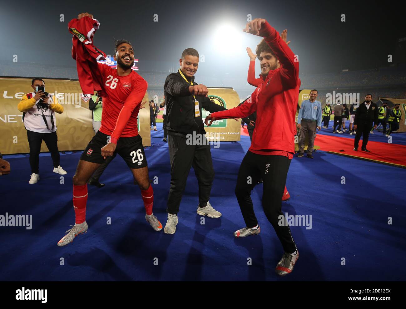Cairo, Egypt. 27th Nov, 2020. (L-R) Al Ahly's Kahraba, Saad Samir and Ahmed El Sheikh celebrate after winning the African Champions League Final soccer match against Zamalek at Cairo International Stadium. Credit: Sameh Abo Hassan/dpa/Alamy Live News Stock Photo