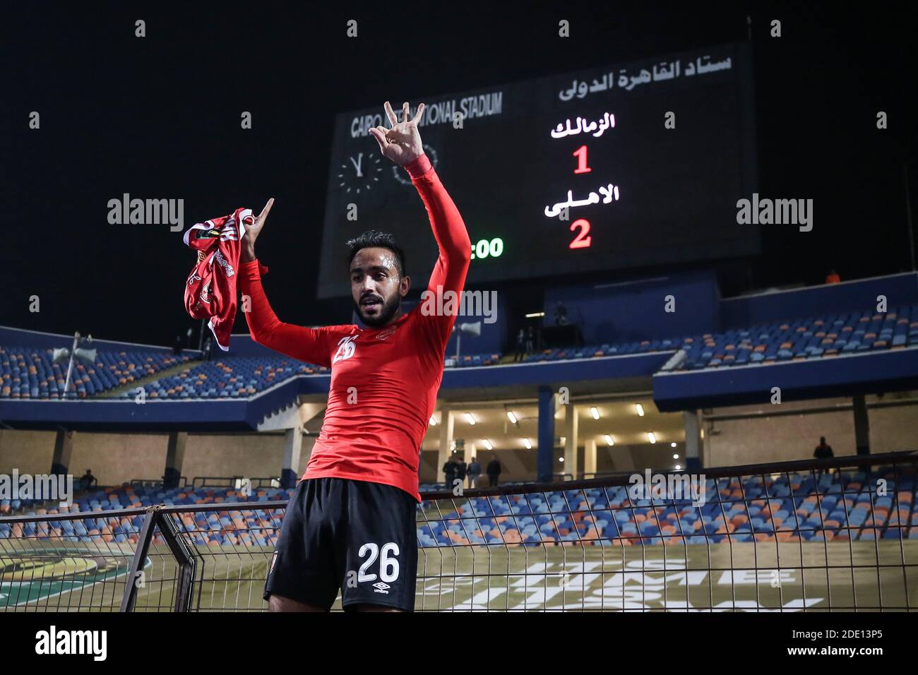 Cairo, Egypt. 27th Nov, 2020. Al Ahly's Kahraba is backdropped by the the score board as he celebrates at the final whistle of the African Champions League Final soccer match against Zamalek at Cairo International Stadium. Credit: Sameh Abo Hassan/dpa/Alamy Live News Stock Photo