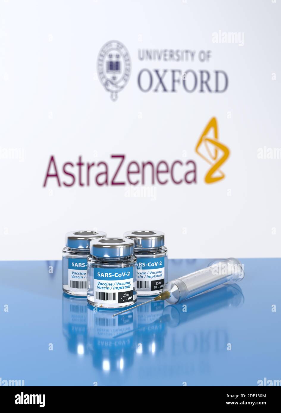 Vaccination against Corona Virus SARS-CoV-2: Three bottles 10 doses each. The word vaccination in English, Spanish, French and German. Logos of Univer Stock Photo