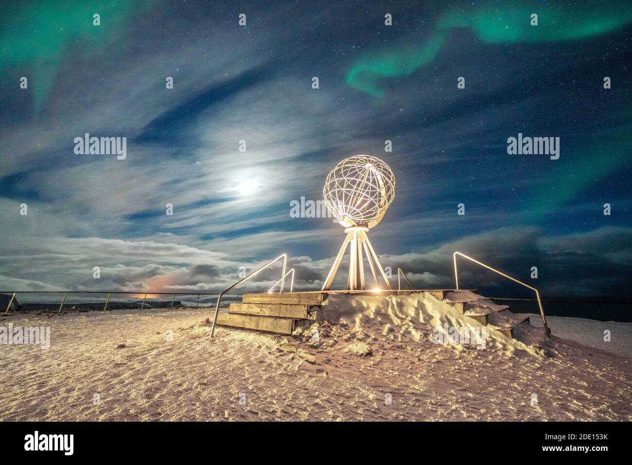 The Northern Lights (Aurora Borealis) over the Globe Monument, symbol of North Cape (Nordkapp), Mageroya island, Troms og Finnmark, Norway Stock Photo