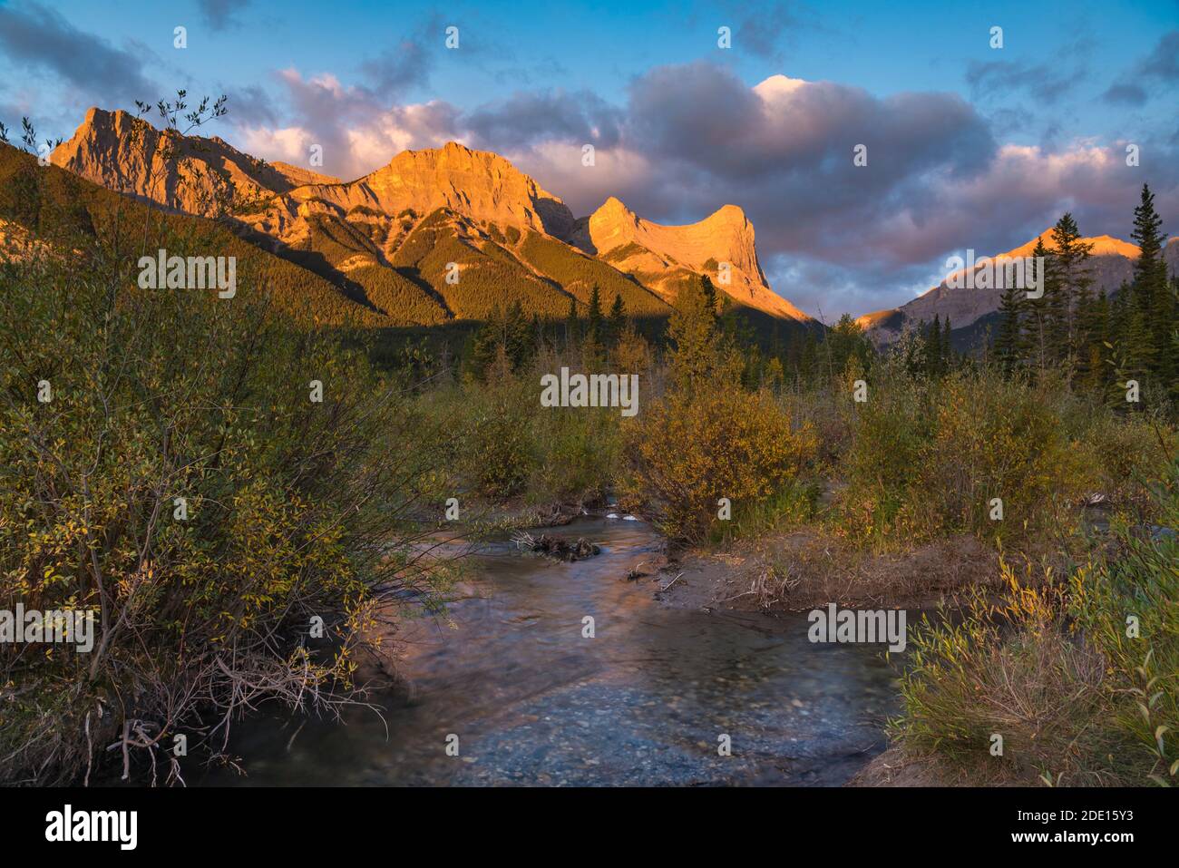 Sunrise and Alpenglow on Mount Lawrence Grassi and Ha Ling Peak in autumn, Canmore, Alberta, Canadian Rockies, Canada, North America Stock Photo
