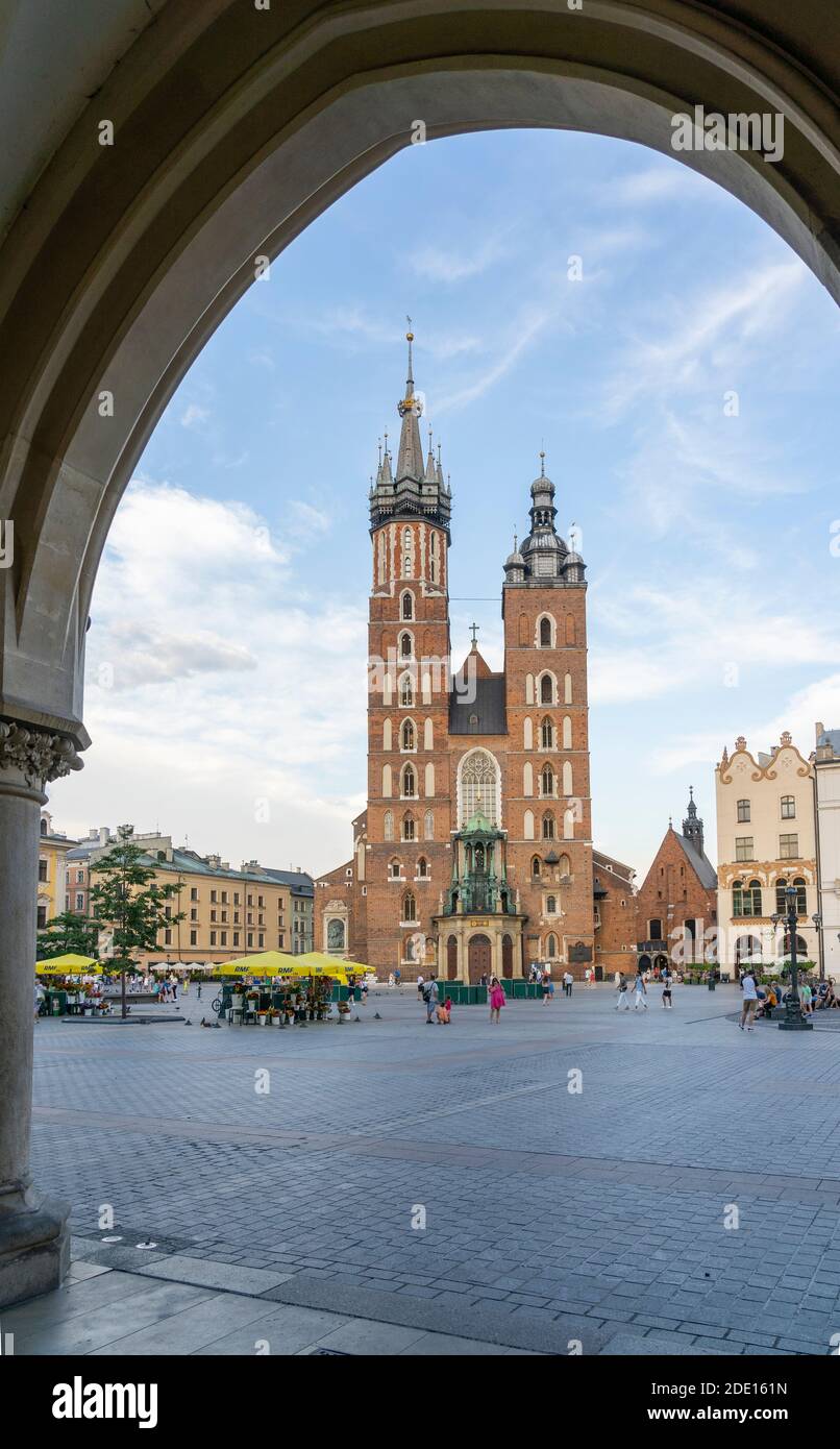 Street scene and St. Marys Basilica, UNESCO World Heritage Site, Krakow, Poland, Europe Stock Photo