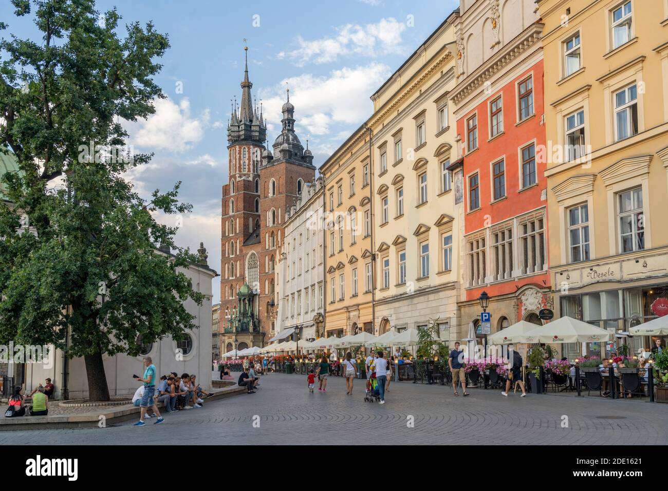 Street scene and St. Marys Basilica, UNESCO World Heritage Site, Krakow, Poland, Europe Stock Photo