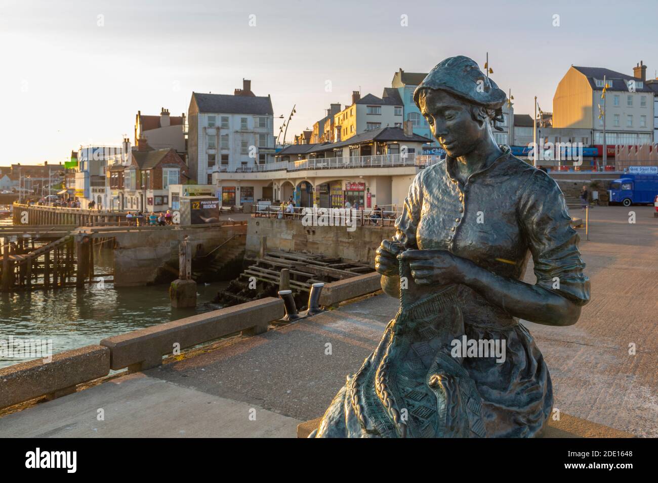 View of the Gansey Girl statue and harbour at sunset, Bridlington, East Yorkshire, England, United Kingdom, Europe Stock Photo
