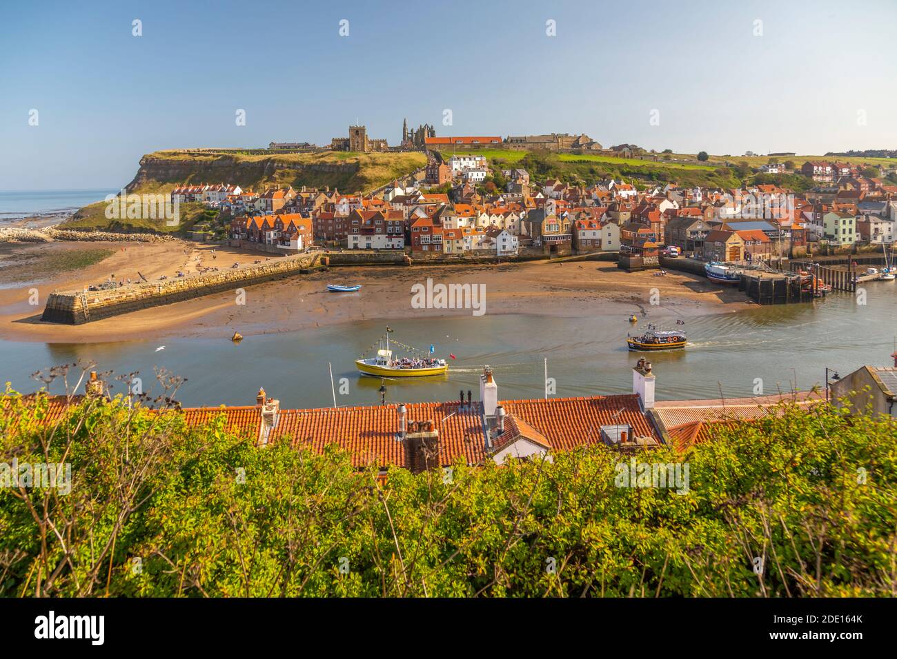 View of Whitby Abbey, St. Mary's Church and Esk riverside houses, Whitby, Yorkshire, England, United Kingdom, Europe Stock Photo