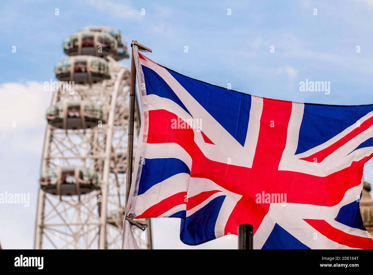 The London Eye (Millennium Wheel) and Union flag, London, England, United Kingdom, Europe Stock Photo