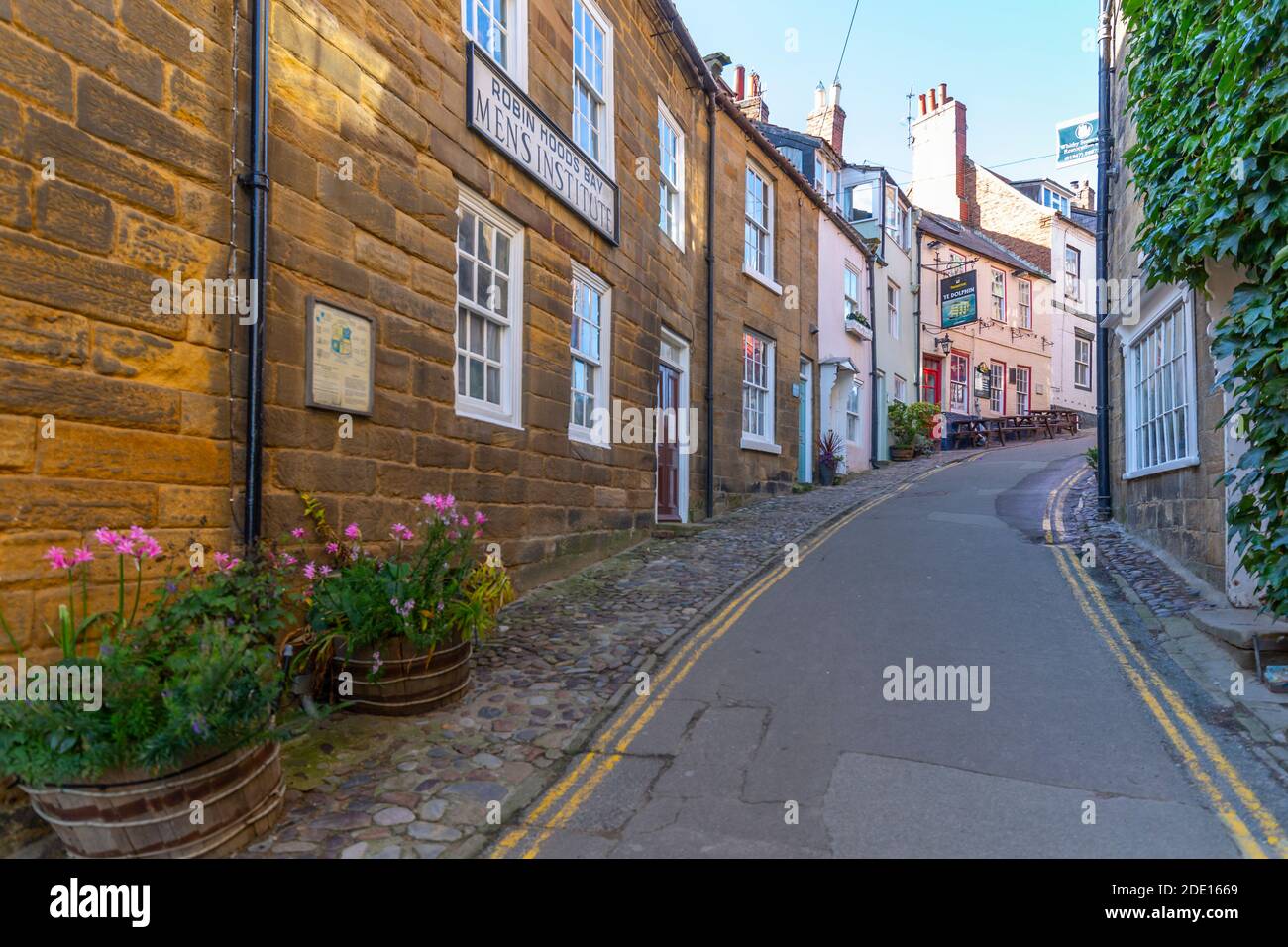 View of pastel coloured houses on King Street in Robin Hood's Bay, North Yorkshire, England, United Kingdom, Europe Stock Photo