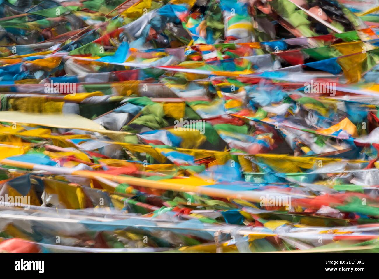 Prayer flags on Tibetan Plateau, Tibet, China Stock Photo