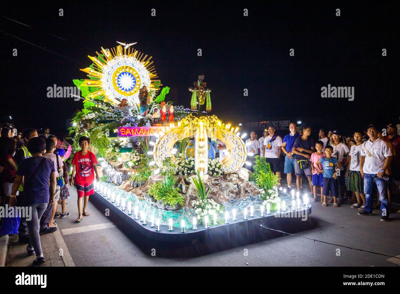 Colorful religious festival floats parade the streets during the Tapusan Festival in Alitagtag, Batangas, Philippines Stock Photo