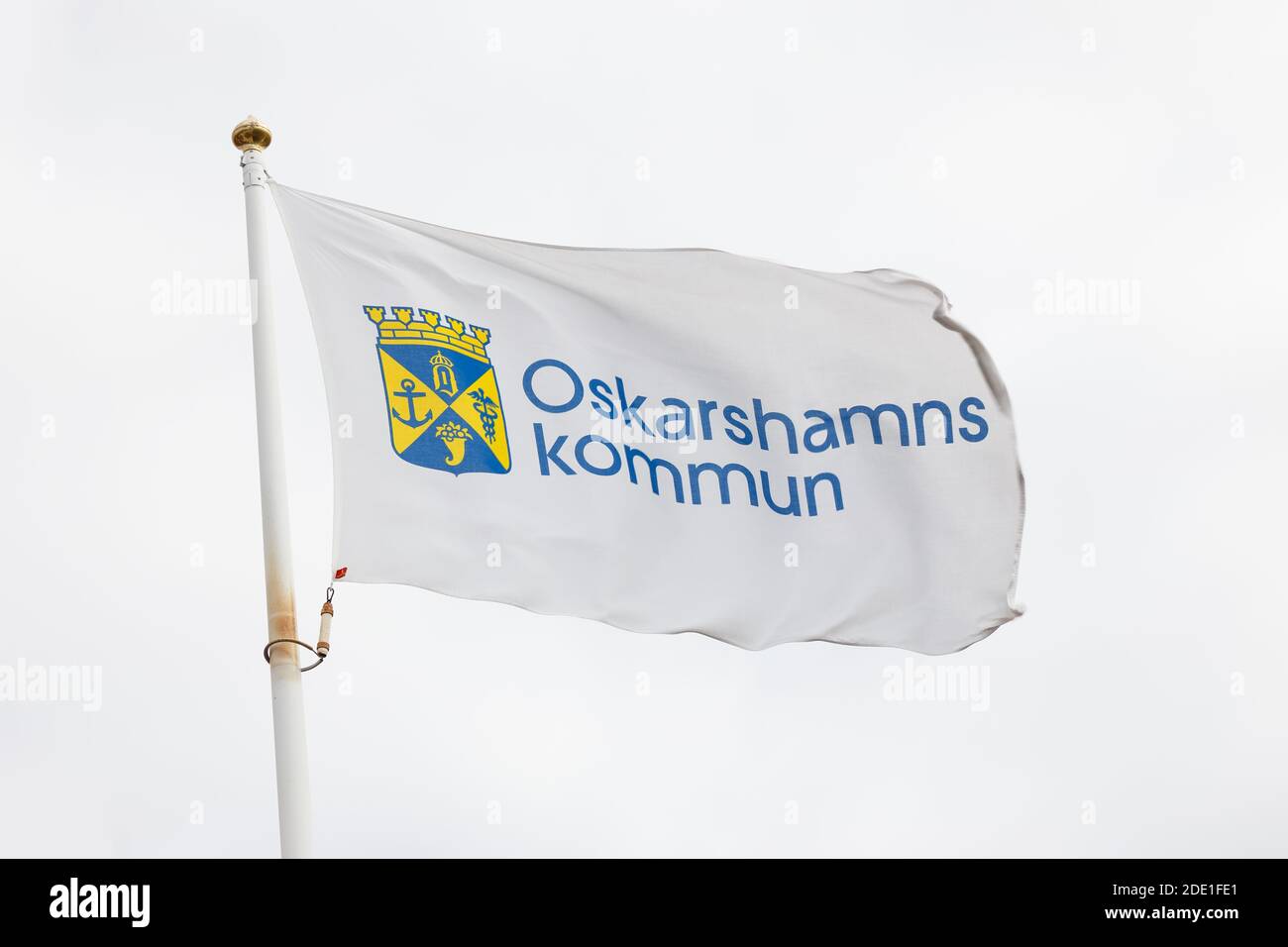 Oskarshamn, Sweden - August 22, 2017: The Oskarshamn municipality flag against a bright sky. Stock Photo