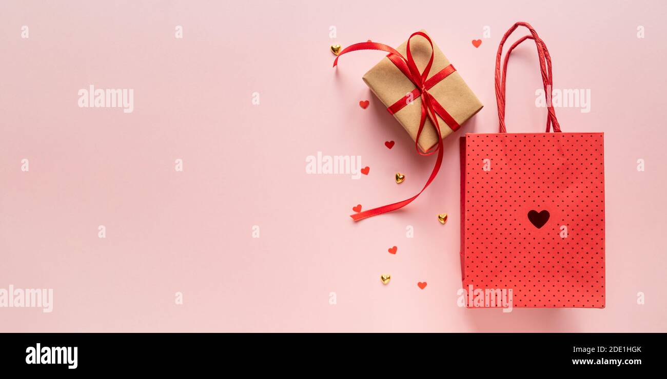 Paper craft Gift box with red ribbon bow, paper bag and red hearts ...
