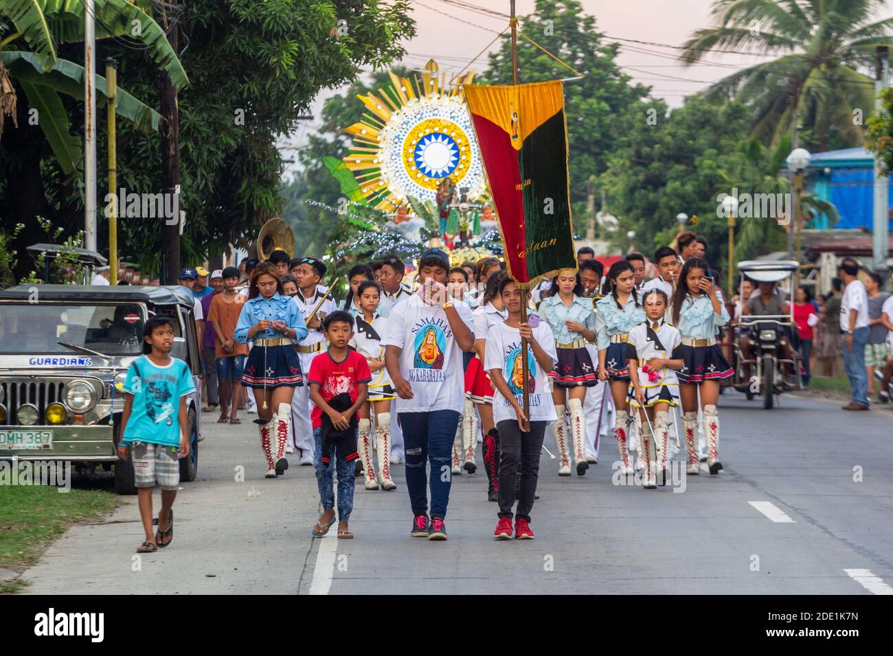 A festival procession with a marching band during the May Flower Tapusan Festival in Alitagtag, Batangas, Philippines Stock Photo