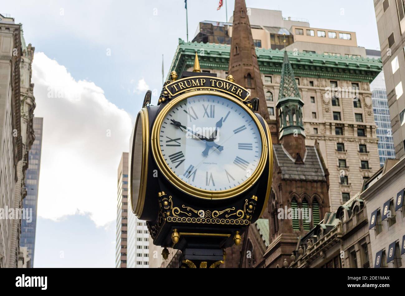 Beautiful Elegant Trump Tower Clock on Fifth Avenue in Front of USA Former President's Residence in Midtown Manhattan. New York City, USA Stock Photo