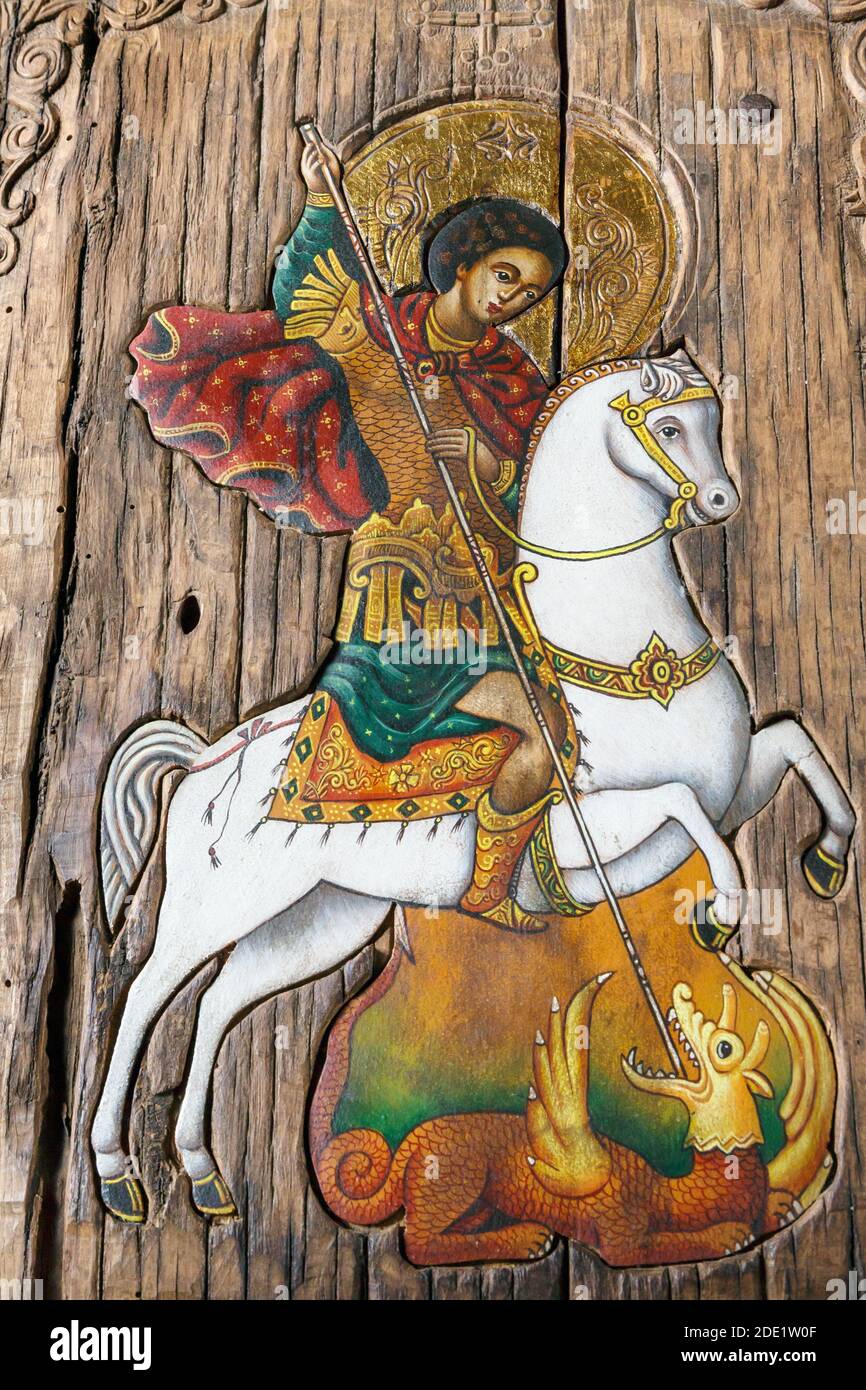 Edirne, Turkey.  Painting on wooden panel of St George killing the Dragon in St George's Bulgarian Orthodox church. Stock Photo