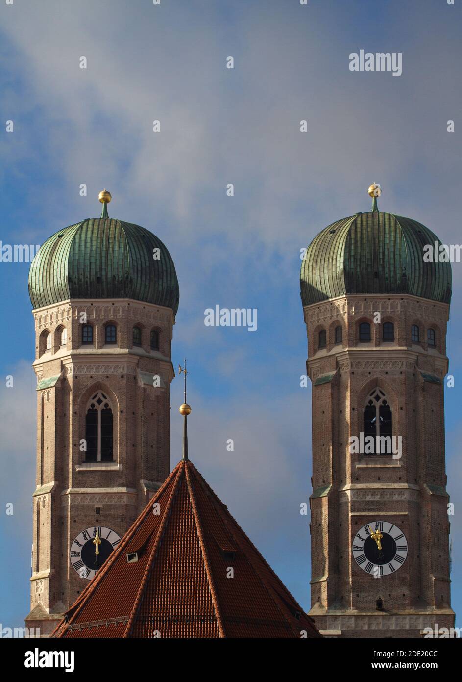 The twin towers of the Munich Frauenkirche. The Frauenkirch is the main landmark of the Bavarian city.  Set against a blue sky with copy space. Stock Photo