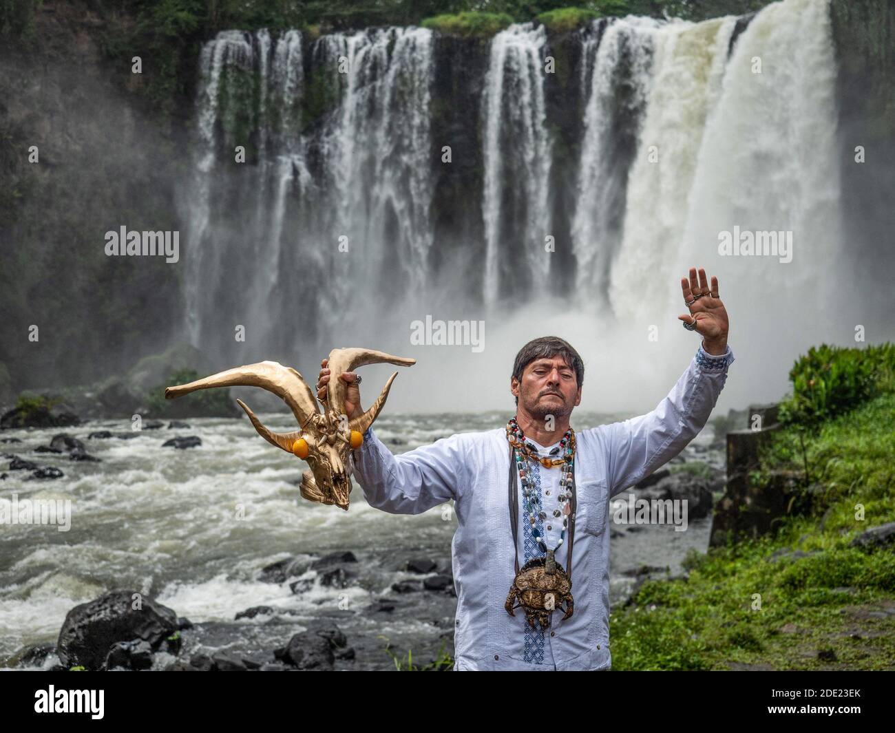 Enrique Marthen Bedron performs a cleaning ritual next to the Salto de  Eyipantla waterfall. Work of traditional shamans of Catemaco called 
