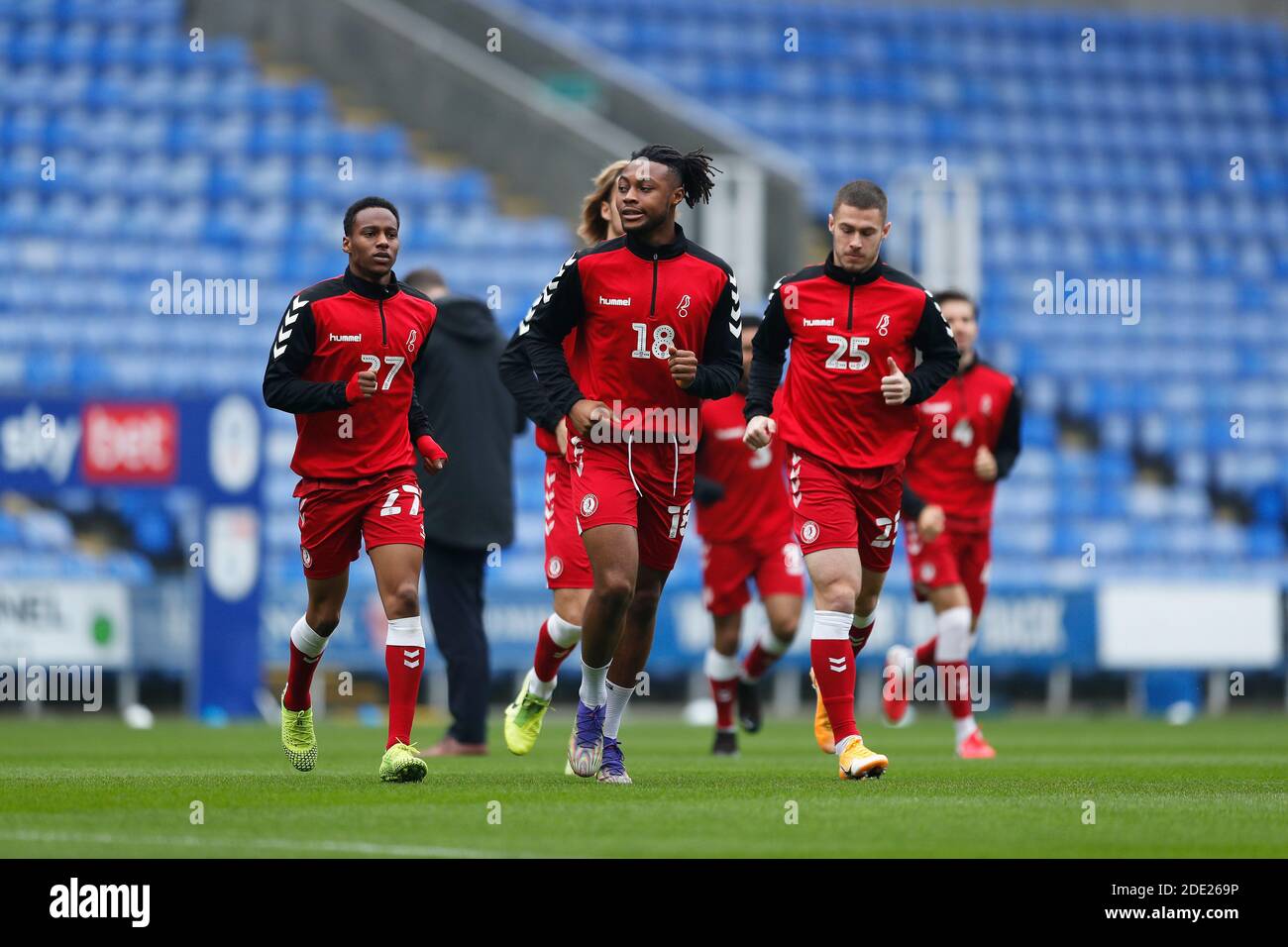 Madejski Stadium, Reading, Berkshire, UK. 28th Nov, 2020. English Football League Championship Football, Reading versus Bristol City; Antoine Semenyo of Bristol City running out onto the pitch before kick off followed by Opi Edwards and Tommy Rowe of Bristol City Credit: Action Plus Sports/Alamy Live News Stock Photo