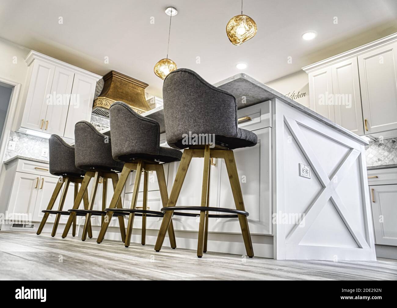 A view of fourbar concept round chairs inside a modern house Stock