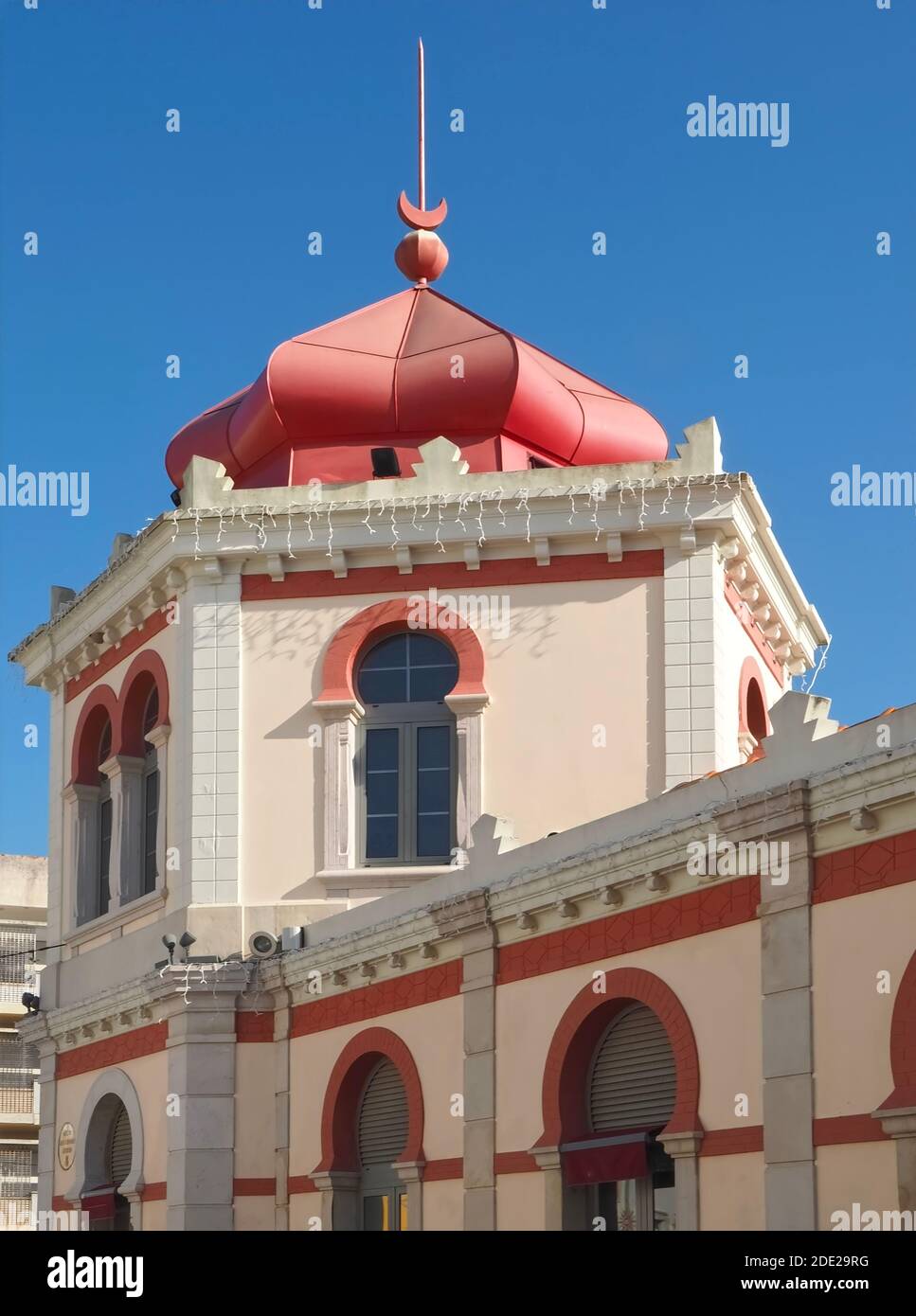 the beauty of Portugal- Pink market hall in Loule near Albufeira Stock Photo