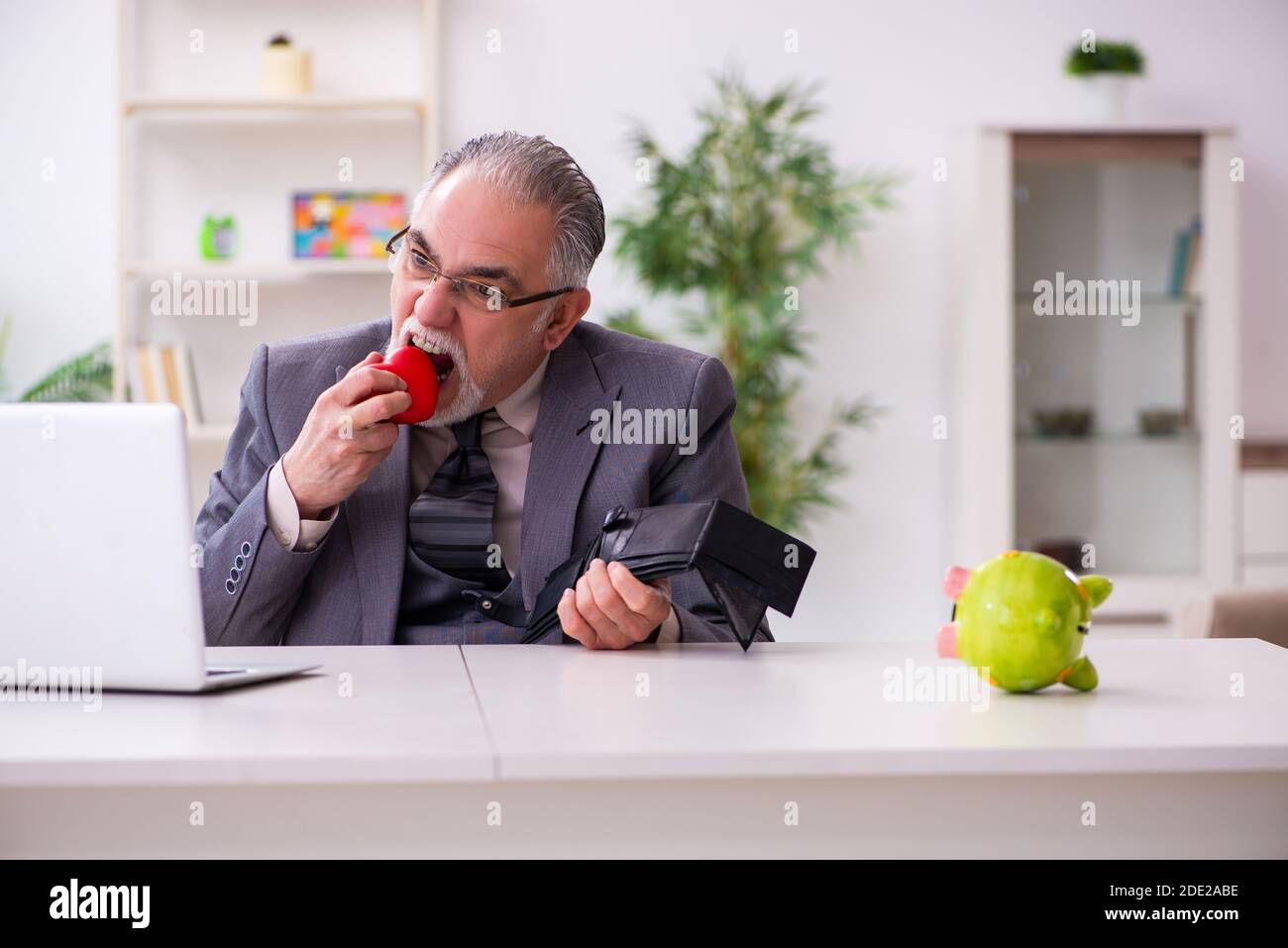 Old man in romantic concept Stock Photo - Alamy