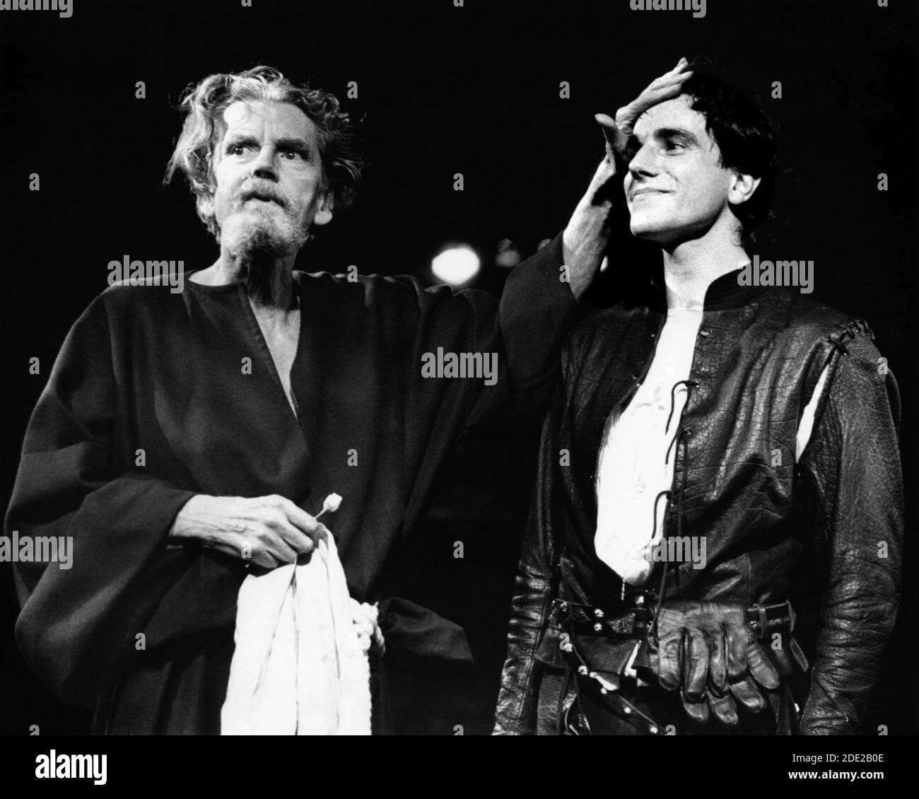 l-r: Robert Eddison (Friar Lawrence), Daniel Day-Lewis (Romeo) in ROMEO AND JULIET by Shakespeare in the Royal Shakespeare Company (RSC) Regional Tour 10/10/1983    set design: Bob Crowley costumes: Priscilla Truett lighting: Brian Harris fights: Malcolm Ranson  director: John Caird Stock Photo