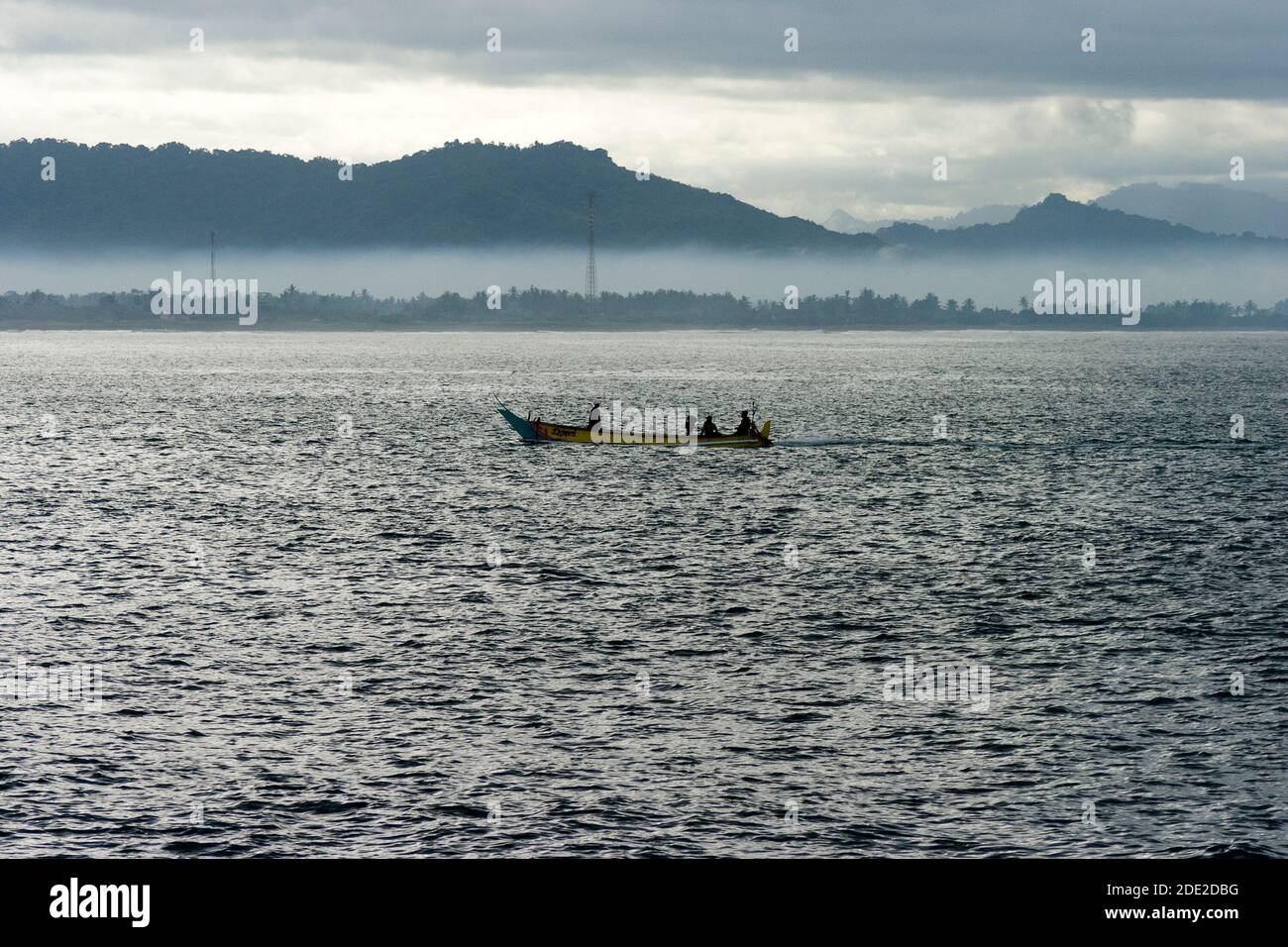 The morning activity of the fishermen at Papuma beach, they go to look for fish by traditional boats. Stock Photo