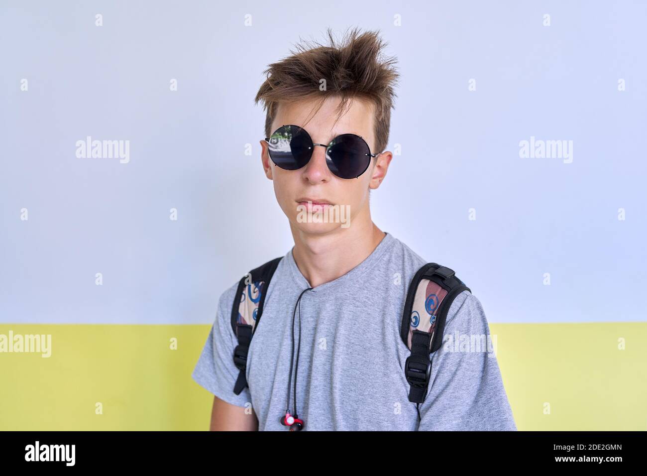 Portrait of teenager student guy 16, 17 years old in fashionable sunglasses  Stock Photo - Alamy